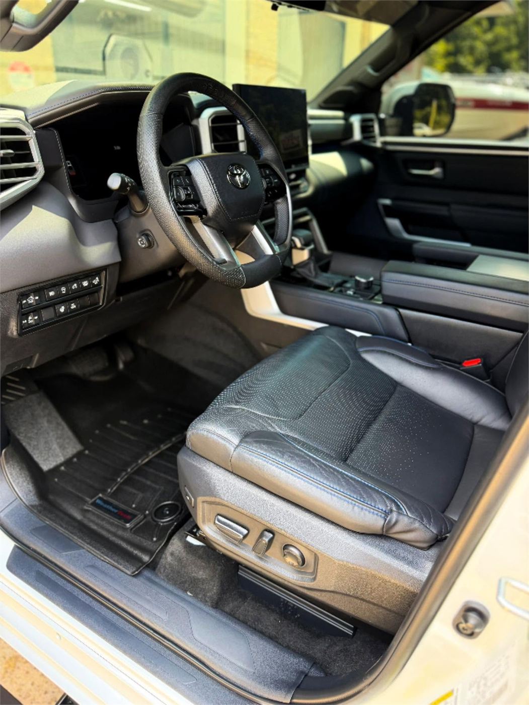 Detailed vehicle interior with clean seats and console